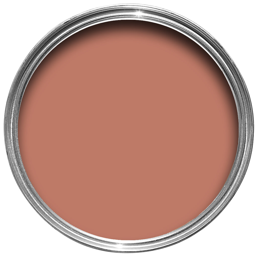 Offene Farbdose von oben von Red Earth, einem erdigen Rot
